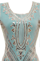 Laden Sie das Bild in den Galerie-Viewer, Grüne schulterfreie Scheide Paillettenkleid aus den 1920er Jahren mit Quasten