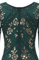 Laden Sie das Bild in den Galerie-Viewer, Schwarzes langes Flapper-Kleid mit V-Ausschnitt aus den 1920er Jahren und Pailletten und Fransen