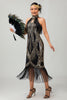 Laden Sie das Bild in den Galerie-Viewer, Glitzerndes Schwarzes Goldenes Pailletten Neckholder Flapperkleid mit Fransen