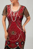 Laden Sie das Bild in den Galerie-Viewer, Glitzerndes Schwarzes Silbernes Pailletten Flapperkleid mit Kurzen Ärmeln und Fransen