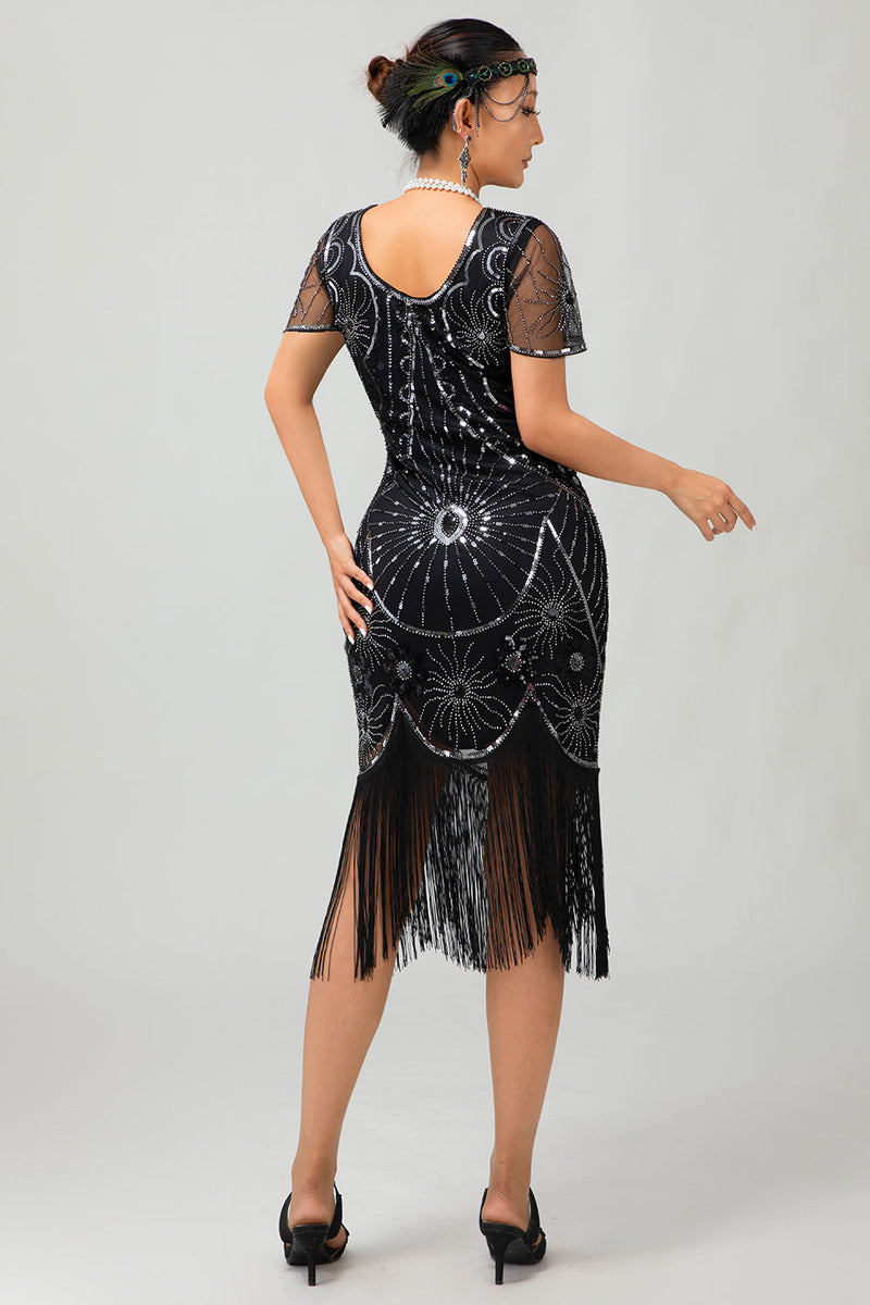 Laden Sie das Bild in den Galerie-Viewer, Glitzerndes Schwarzes Silbernes Pailletten Flapperkleid mit Kurzen Ärmeln und Fransen