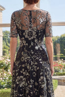 Laden Sie das Bild in den Galerie-Viewer, Bootsausschnitt Glitzerndes Schwarz Blumen A Linie Lang Kleid für die Mutter der Braut